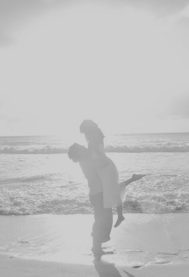 Belinda and Thomas celebrating together at the beach